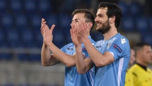 SS Lazio's players Marco Parolo (R) and Stefan Radu celebrates after the UEFA Europa League soccer match between SS Lazio and Galatasaray at the Olimpico stadium in Rome, Italy, 25 February 2016. ANSA/ETTORE FERRARI
